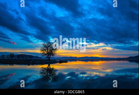 Sunset images on Utah Lake. This area can provide beautiful sunsets and reflections in the water. Stock Photo
