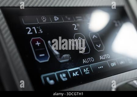 Car digital climate touchscreen shows dual zone 21.5 C and AUTO mode Stock Photo