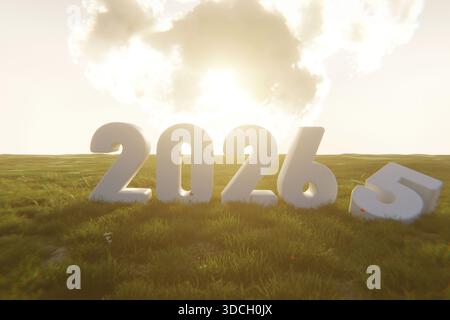Large white 3D numbers “2026” stand on a grassy field under a bright sunrise, symbolizing a new year, hope, and the transition from 2025 to 2026 with Stock Photo