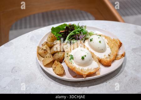 Eggs Benedict dish for breakfast. High angle view. Stock Photo