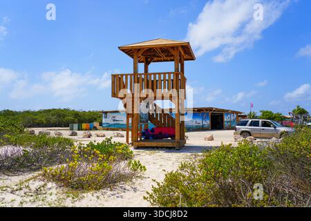 Wooden Observation Tower on Sorobon Beach in Lac Bay, a tropical lagoon with shallow turquoise waters on the southeast coast of Bonaire island in the Stock Photo