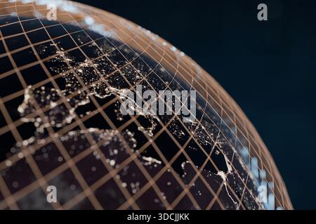Glowing Earth with illuminated cities at night covered by a golden digital grid lines, symbolizing global networks, technology, connectivity, and mode Stock Photo