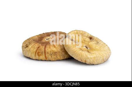 Two healthy dried figs, isolated on a plain white background Stock Photo