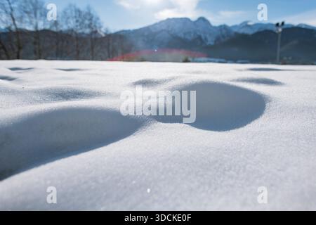 Winter holidays and snow texture. Detailed view of pristine snowdrifts. Natural, cool-toned white and blue winter texture with soft light and shadow p Stock Photo