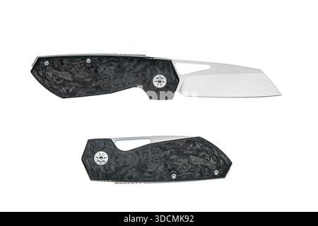 Two tactical folding knives with forged carbon fiber handles isolated on a white background. Stock Photo
