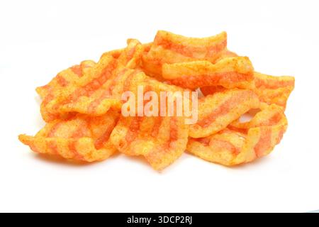 Bacon Chips. Delicious bacon snacks isolated on white background. Pelleted salted snack bacon. Smoked bacon flavored chips. Stock Photo