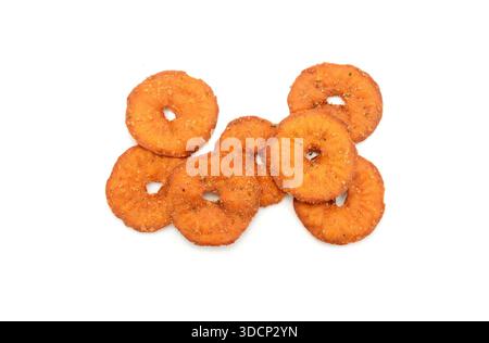 Salted round pretzels isolated on white. Cracker chips with sea salt isolated on white background. Round shape appetizers. Salty crackers isolated Stock Photo