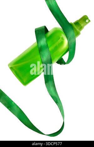 Green spraying plastic bottle tied with green ribbon isolated on white background Stock Photo