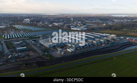 Aerial drone video of the Winschoten data center in The Netherlands, highlighting large-scale cloud computing infrastructure powered by solar energy, Stock Photo