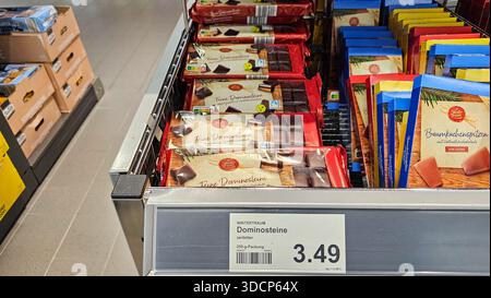 Menden, NRW, Germany – July 29, 2025 Dominoes in the supermarket: Seasonal Christmas biscuits on the shelves Stock Photo