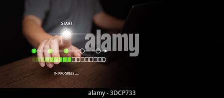 Man with laptop pressing start button with digital progress bar showing task completion stages, project workflow, process tracking, loading status, pr Stock Photo