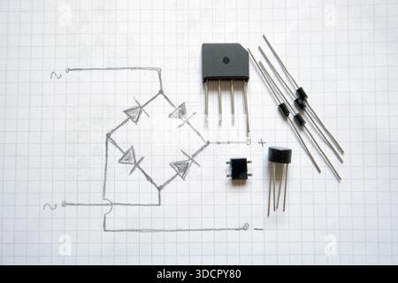 Bridge diode and its diagram. Semiconductor Ac-Dc converter components. Stock Photo