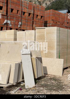 stacked construction block piles pattern Stock Photo - Alamy