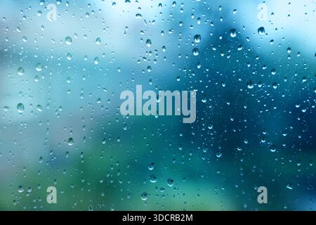 Glass surface with water drops, closeup view Stock Photo