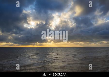 Ocean under cloudy sky Stock Photo