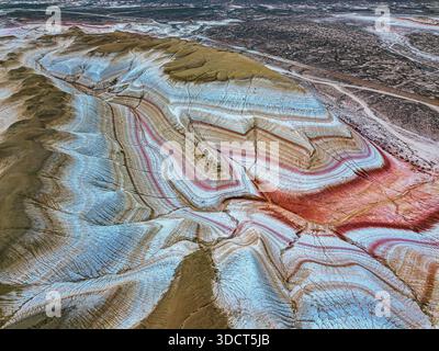 Drone aerial image of Kyzylkup gorge - also called Tiramisu Mount due to its colorful layers. Mangystau, westen Kazakhstan. Stock Photo