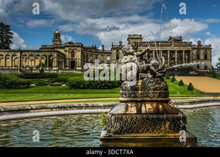 Classical stone fountain sculpture in front of the ruined Witley Court mansion in Worcestershire, England. Stock Photo