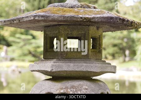 Close-up of a moss-covered stone lantern in the Seattle Japanese Garden Stock Photo