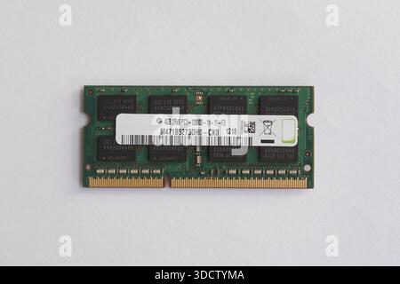 Top View Flat Lay of DDR3 RAM Stick	Direct overhead view of a computer memory module. Clearly displays the Samsung chips, product label, and circuitry Stock Photo