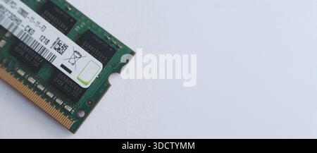 Extreme close-up of a laptop memory module label featuring a WEEE recycle bin symbol. Highlights eco-friendly electronics disposal and technical compo Stock Photo