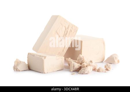 Blocks of fresh yeast on white background Stock Photo