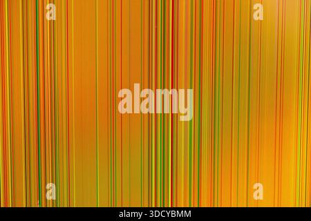 Close-up view of a malfunctioning digital display, showing bright vertical bands in red, green, and yellow on an orange background, useful for tech is Stock Photo