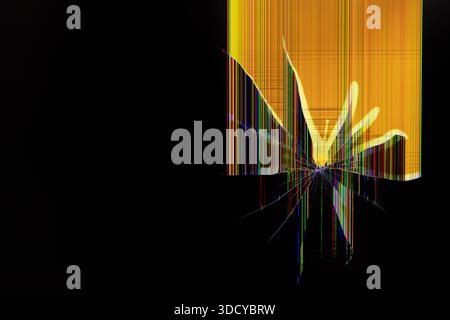 Close-up of a severely damaged digital display showing bright multi-colored vertical lines, radial cracks, conveying device failure, data loss, and es Stock Photo