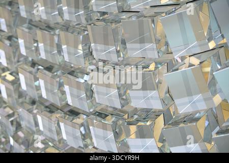 Close-up of geometric crystal elements forming a reflective grid pattern. Stock Photo