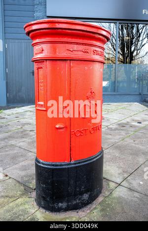 December 2025 - Traditional red GR posting boxes in the Somerset village of Yatton Stock Photo