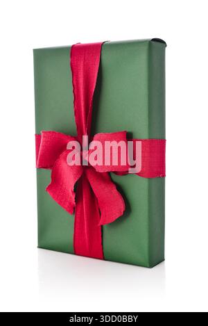 Green gift box with red bow isolated on white background, clipping path included Stock Photo
