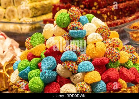 Close-up of vibrant colorful candies and sweets displayed in a traditional candy shop Stock Photo