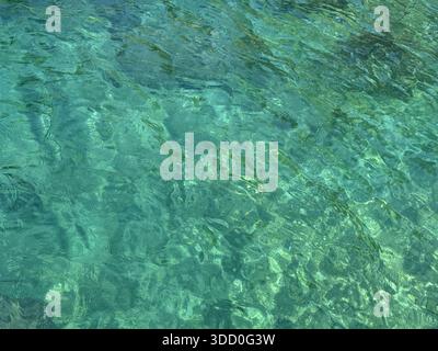 Ocean water clear emerald rippled surface Stock Photo