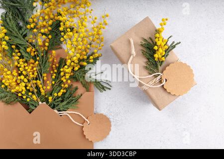 Eco friendly gift with mimosa for spring promotion Stock Photo