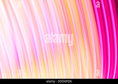 Diagonal Pink and Yellow Light Streaks Abstract Background Stock Photo