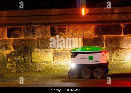 Uber Eats delivering takeaway food around Headingley in Leeds with  Starship Technologies autonomous robots. Stock Photo