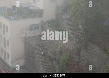 Old stairs in fog, outside in city Stock Photo