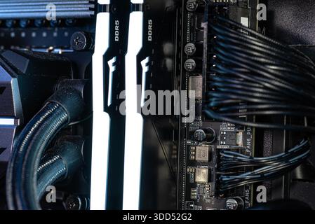 The inside of a modern computer assembled in 2025, showing DDR5 memory and other components. Stock Photo