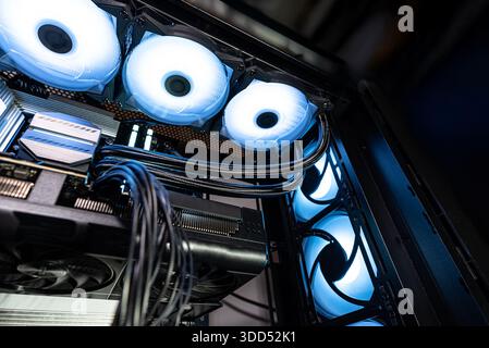 The inside of a modern computer assembled in 2025, showing DDR5 memory and other components. Stock Photo