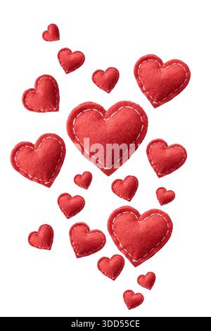 flying red felt hearts isolated white background, fuzzy fabric texture with visible white stitching along edges, floating arrangement for valentine's Stock Photo