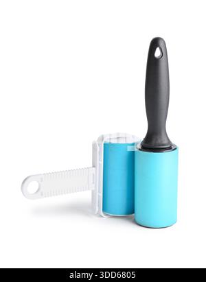Different lint rollers on white background Stock Photo