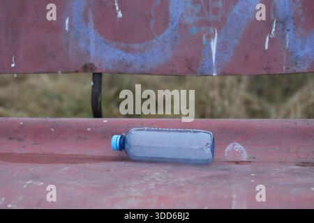 Empty plastic bottle flagon thrown into nature Stock Photo