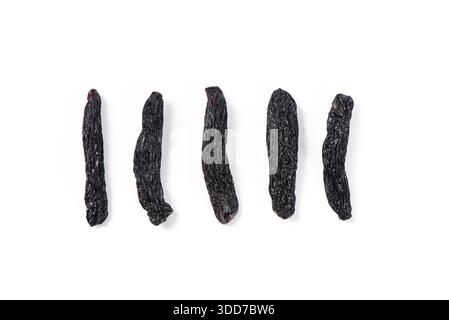 black raisins isolated on white background Stock Photo