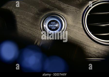 Start stop engine button on a modern car dashboard Stock Photo