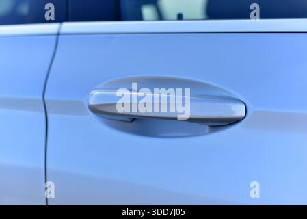 Handle on the passenger car door Stock Photo
