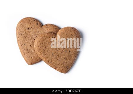 Heart-shaped gingerbread cookies isolated on white background Stock Photo