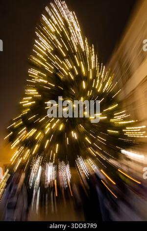 A captivating abstract photograph capturing the vibrant energy of Christmas lights in Salzburg. Long exposure creates mesmerizing light trails, swirli Stock Photo