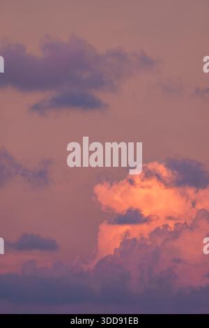 Dramatic red evening sky with low-level deep red stratocumulus cloud formation and sky. Stock Photo