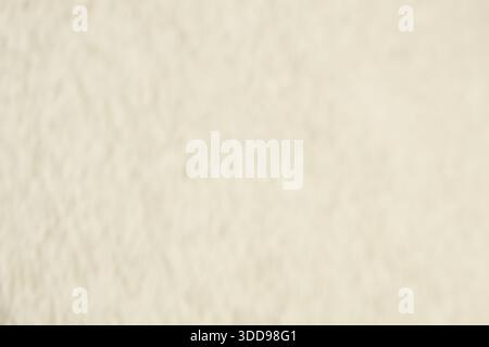 Beige Coarse Plaster Wall Blurred Background Texture Stock Photo