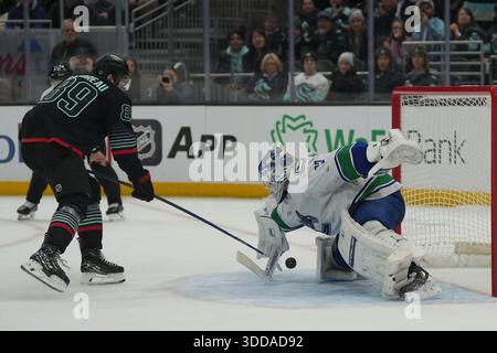 Seattle Kraken center Frederick Gaudreau (89) blocks a shot from ...