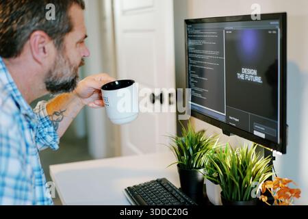 Middle Aged Software Engineer Vibe Codes Landing Page for Artificial Intelligence Based Integrated Development Environment Application Concept Stock Photo